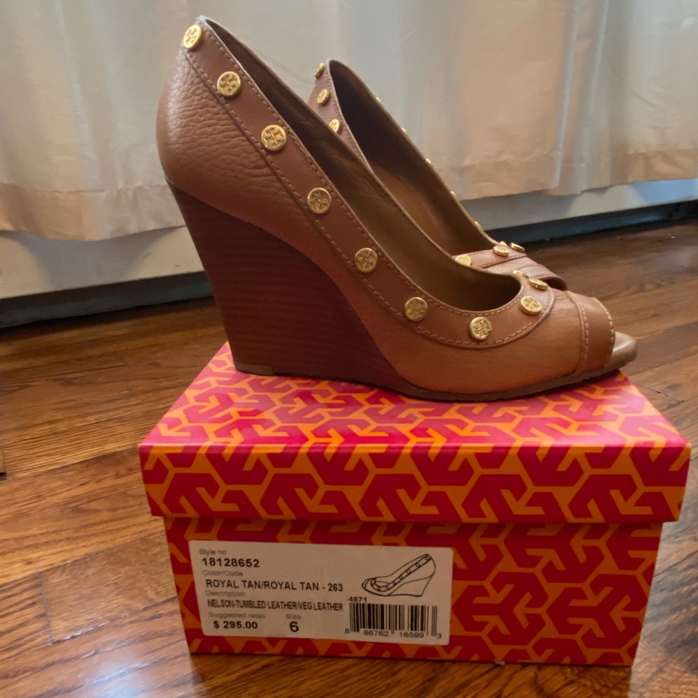 Wedge peep toe sandal by Tory Burch.